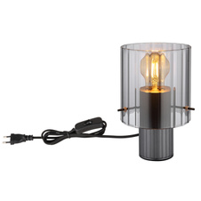 Stolní lampa, kov šedý tmavý, sklo kouřové barvy s drážkami, textilní kabel černý, kolébkový vypínač na kabelu, ø: 14cm, výška: 22cm, délka kabelu 150cm, bez žárovky 1xE27, max. 40W 230V