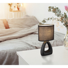 Stolní lampa, černá keramika, černý textil, černý PVC kabel, kolébkový vypínač na kabelu, DxŠxV: 170x100x300mm, délka kabelu 1300mm, bez žárovky 1xE14, max. 40W 230V